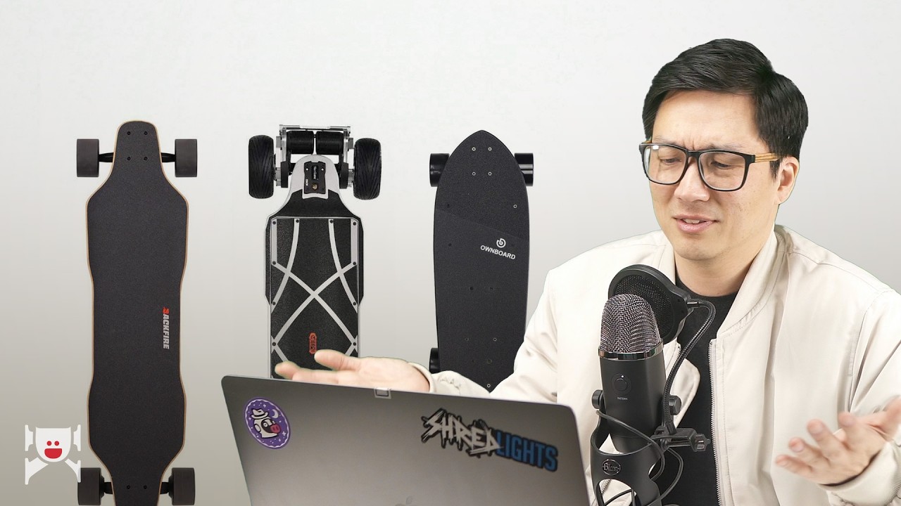 Daniel Kwan discussing electric skateboard recommendations with three boards beside him